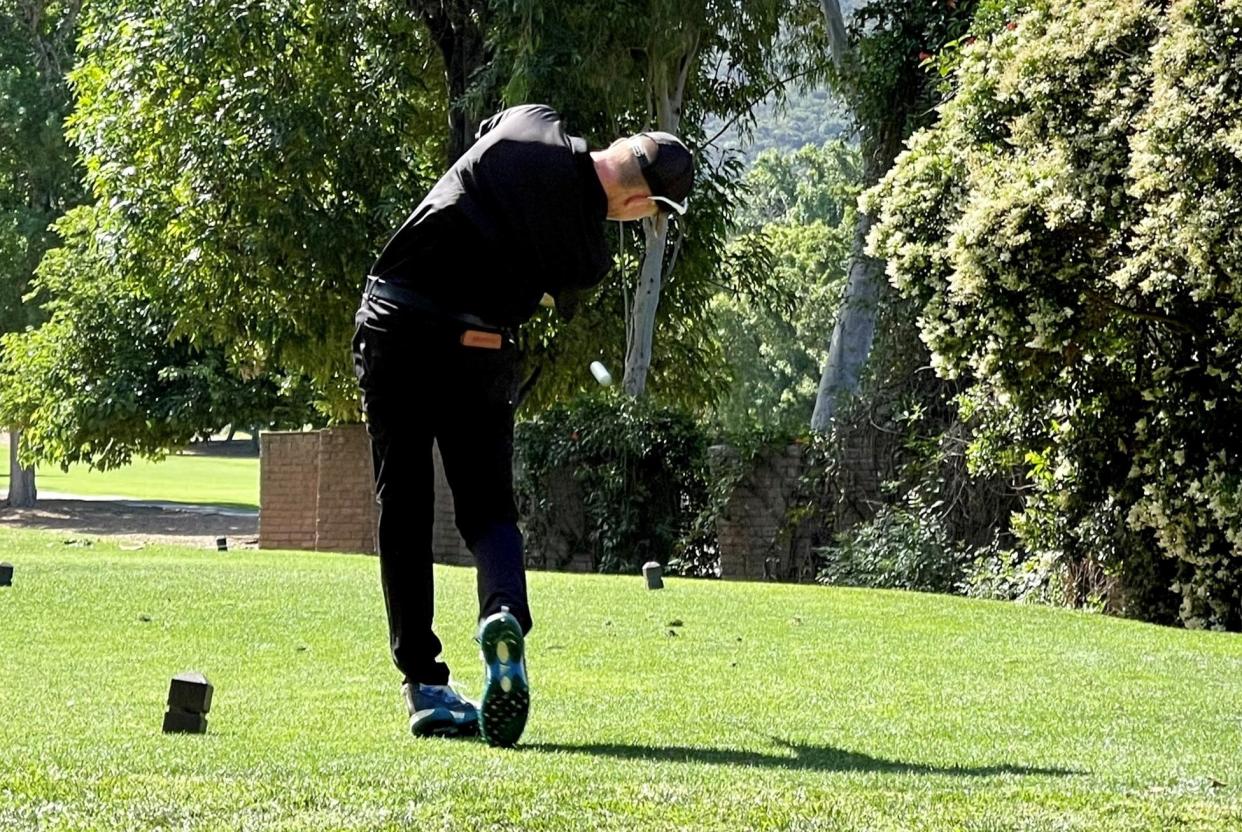 Buena High freshman Adam Anderson hits a tee shot at Los Robles Greens Golf Course in Thousand Oaks during the CIF-SS Northern Regional Individuals tournament Monday. Anderson finished first after shooting an 8-under 62.