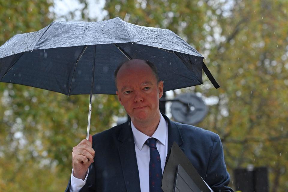 Britain's Chief Medical Officer for England Chris Whitty walks through Westminster in London on October 31, 2020. - British Prime Minister Boris Johnson convened his cabinet on October 31 to decide whether to impose a new lockdown across England within days, following warnings his localised restrictions strategy has failed to curb soaring coronavirus rates. (Photo by JUSTIN TALLIS / AFP) (Photo by JUSTIN TALLIS/AFP via Getty Images)