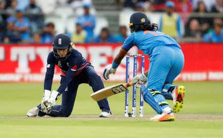 Cricket - Women's Cricket World Cup Final - England vs India - London, Britain - July 23, 2017 England's Sarah Taylor runs out India's Shikha Pandey Action Images via Reuters/John Sibley