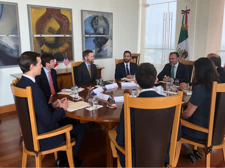 Jared Kushner, senior adviser to U.S. President Donald Trump, listens to Mexican Foreign Ministry Luis Videgaray (R) during a meeting at the foreign ministry building, in this handout photograph released to Reuters by the Mexico Presidency, March 7, 2018. Mexico Presidency/Handout via REUTERS