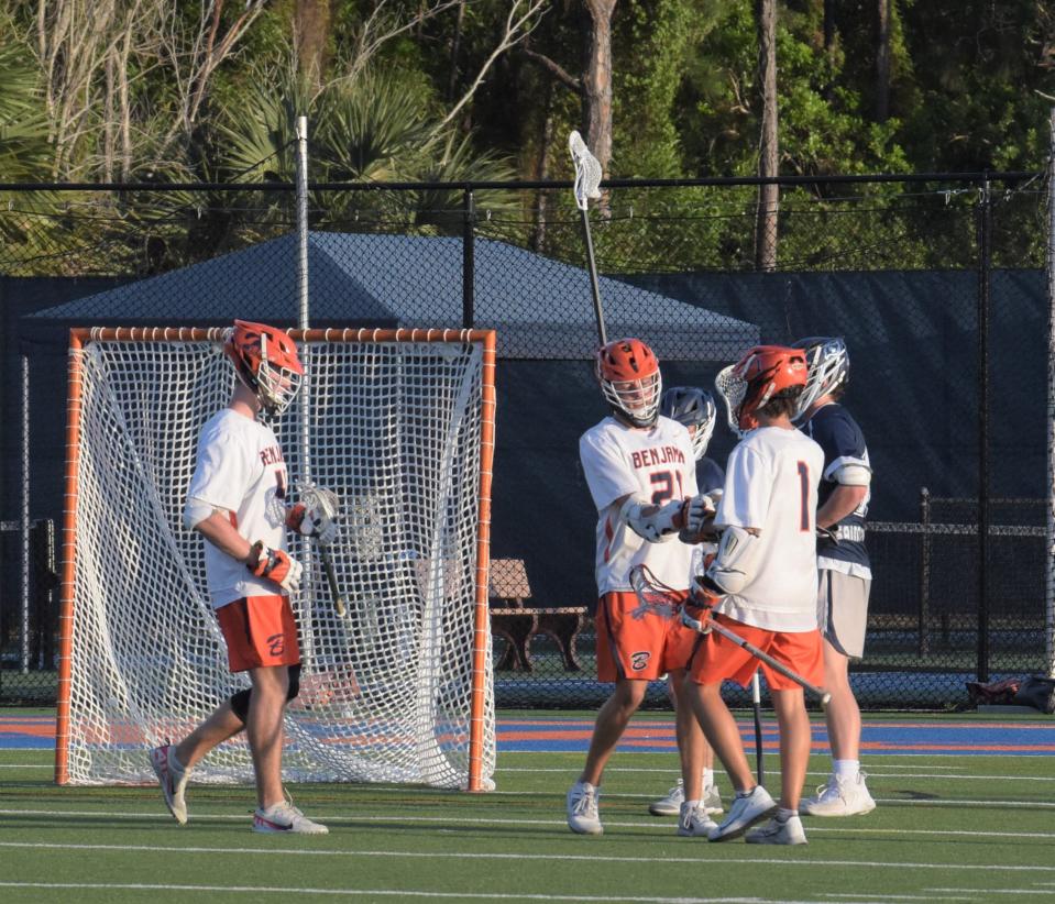 Benjamin's Jack Kelleher is congratulated by teammate Alex Ponchock after scoring a goal during a district finals match against St. Edward's on April 17, 2024.