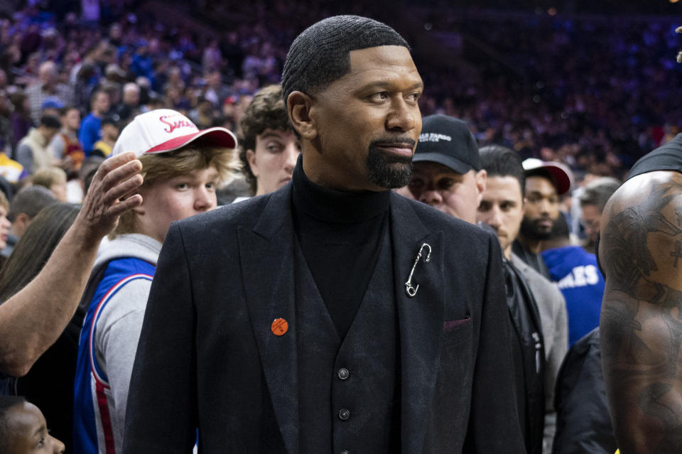 FILE - ESPN analyst Jalen Rose looks on prior to the first half of an NBA basketball game between the Los Angeles Lakers vs the Philadelphia 76ers, Saturday, Jan. 25, 2020, in Philadelphia. Jeff Van Gundy, Suzy Kolber, Jalen Rose and Steve Young are among roughly 20 ESPN commentators and reporters who were laid off on Friday, June 30, 2023, as part of job cuts by the network. (AP Photo/Chris Szagola, File)