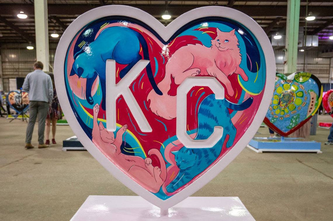 “Cats if KC” by artist Emily Johnson is displayed during the Parade of Hearts reveal kickoff event at the American Royal Hale Arena on Friday, April 12, 2024, in Kansas City.