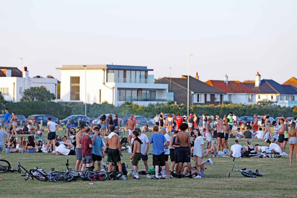 Large groups of people gather down the park at Goring Gap, Worthing, as the UK continues to introduce measures to gradually bring the country out of the coronavirus lockdown.  