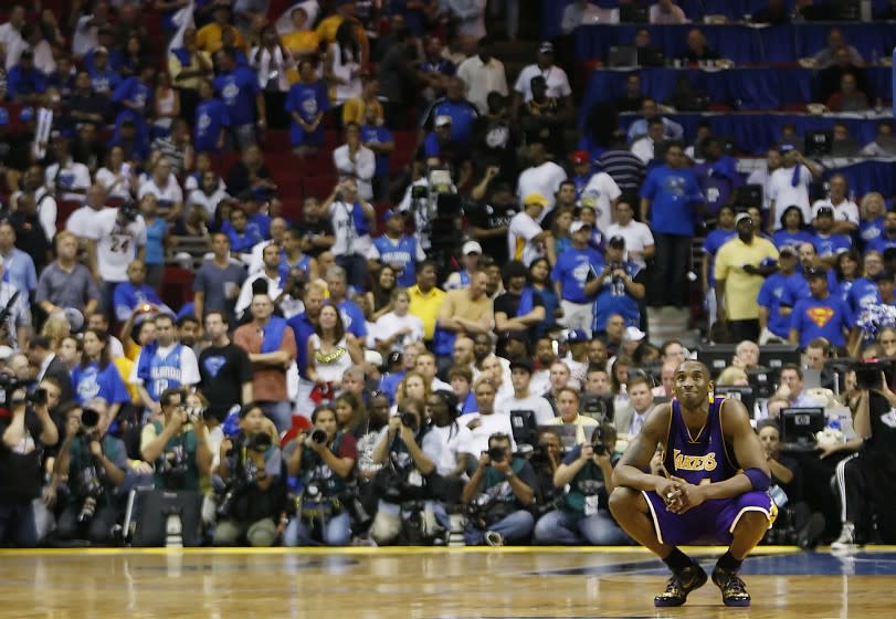 Gauthier, Robert –– – (Orlando, Florida – Sunday, June 14, 2009) With a look of satisfaction on his face, Kobe Bryant looks up into the crowd as the clock winds down on his fourth NBA Championship as the Lakers beat Orlando 99–86 in game five at Amway Arena.
