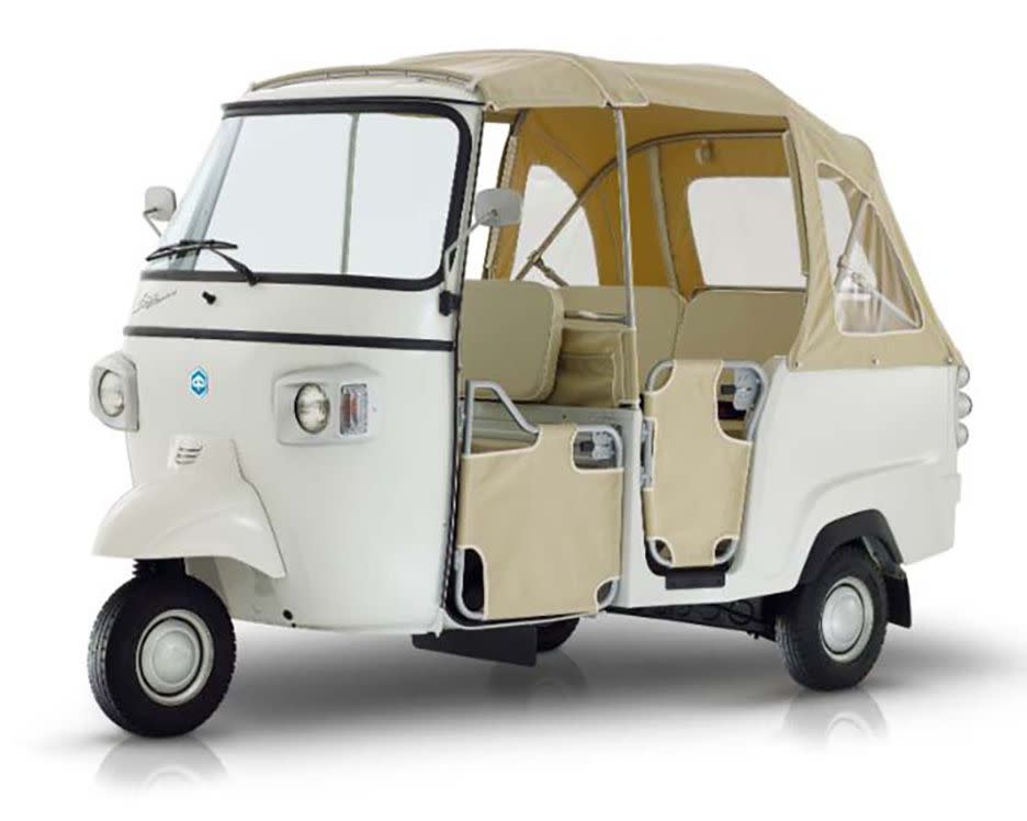 Beige Piaggio Ape Calessino on white background