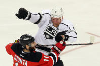 NEWARK, NJ - JUNE 09: Matt Greene #2 of the Los Angeles Kings collides with Stephen Gionta #11 of the New Jersey Devils during Game Five of the 2012 NHL Stanley Cup Final at the Prudential Center on June 9, 2012 in Newark, New Jersey. (Photo by Jim McIsaac/Getty Images)
