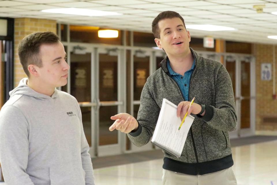 Tom Roberts, playing Cinderella's prince, left, and Ben Johnson, playing Rapunzel's prince work a scene during rehearsal for the Sheboygan Theatre Company’s “Into the Woods”, Wednesday, January 24, 2024, in Sheboygan, Wis.