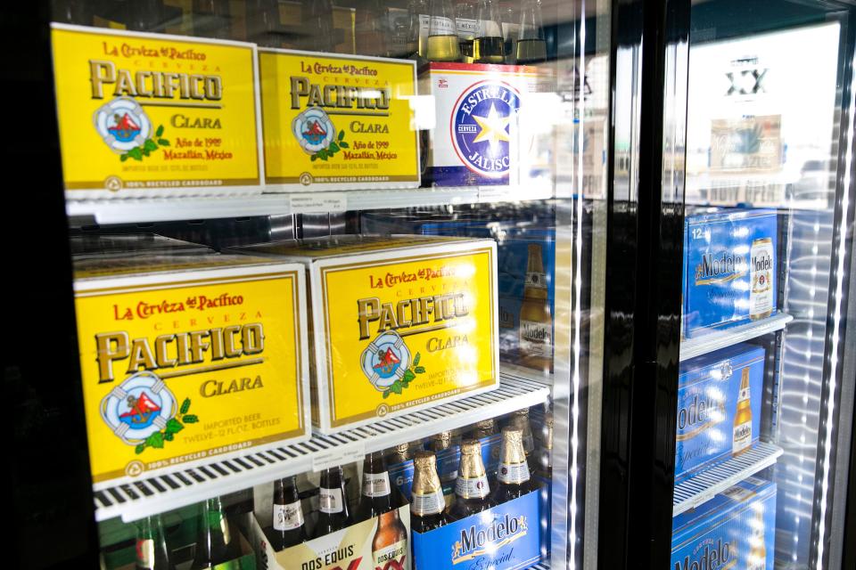 This a 2023 file photo of coolers stocked full of beer at a store. A Texas man was arrested on Feb. 27, 2024 after police say he rammed his truck into a convenience store. Reports say the man was mad that the beer coolers were locked.