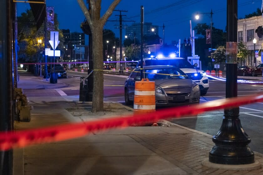 Chicago police work the scene where the a 5-month-old girl was shot and killed in the 7100 block of South Crandon Avenue, in the South Shore neighborhood of Chicago, Friday, June 24, 2022. The shooting initially took place in the 7700 block of South South Shore Drive. (Tyler Pasciak LaRiviere/Chicago Sun-Times via AP)