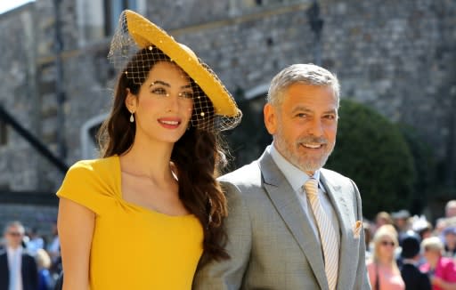 Amal Clooney and US actor George Clooney arrive for the wedding at Windsor Castle