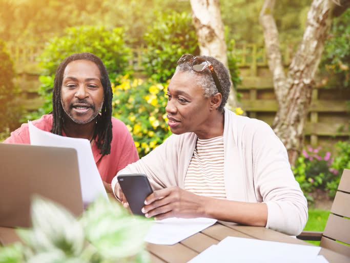 A couple reviewing an estate plan to help their family avoid probate.