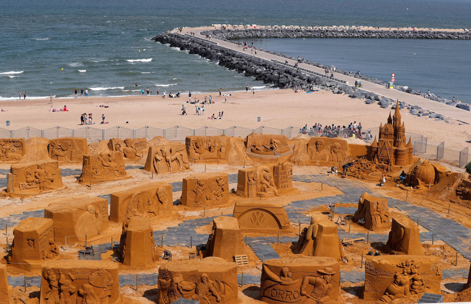 <p>Sand sculptures are seen during the Sand Sculpture Festival “Disney Sand Magic” in Ostend, Belgium June 22, 2017. A team of 32 carvers from around the world spent five weeks building 150 sculptures based on Disney, Pixar, Star Wars and Marvel movies. Seven thousand tonnes of sand brought by 240 trucks were needed to make the sculptures which will be on show between June 24 to September 10. (Yves Herman/Reuters) </p>