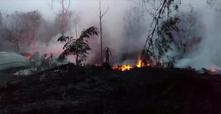 A view shows a lava fissure in Leilani Estates, Hawaii, U.S. May 9, 2018, in this still image taken from a social media video. Apau Hawaii Tours/Social Media via REUTERS