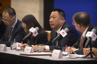 Song Liuping, chief legal officer of Huawei, speaks during a press conference at Huawei's campus in Shenzhen in southern China's Guandong Province, Thursday, Dec. 5, 2019. Chinese tech giant Huawei is asking a U.S. federal court to throw out a rule that bars rural phone carriers from using government money to purchase its equipment on security grounds. (AP Photo/Mark Schiefelbein)