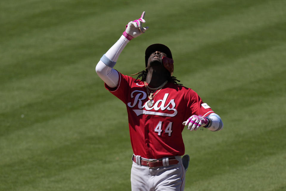 Cincinnati Reds' Elly De La Cruz gestures as he scores after hitting a three-run home run during the fifth inning of a baseball game against the Los Angeles Angels Wednesday, Aug. 23, 2023, in Anaheim, Calif. (AP Photo/Mark J. Terrill)