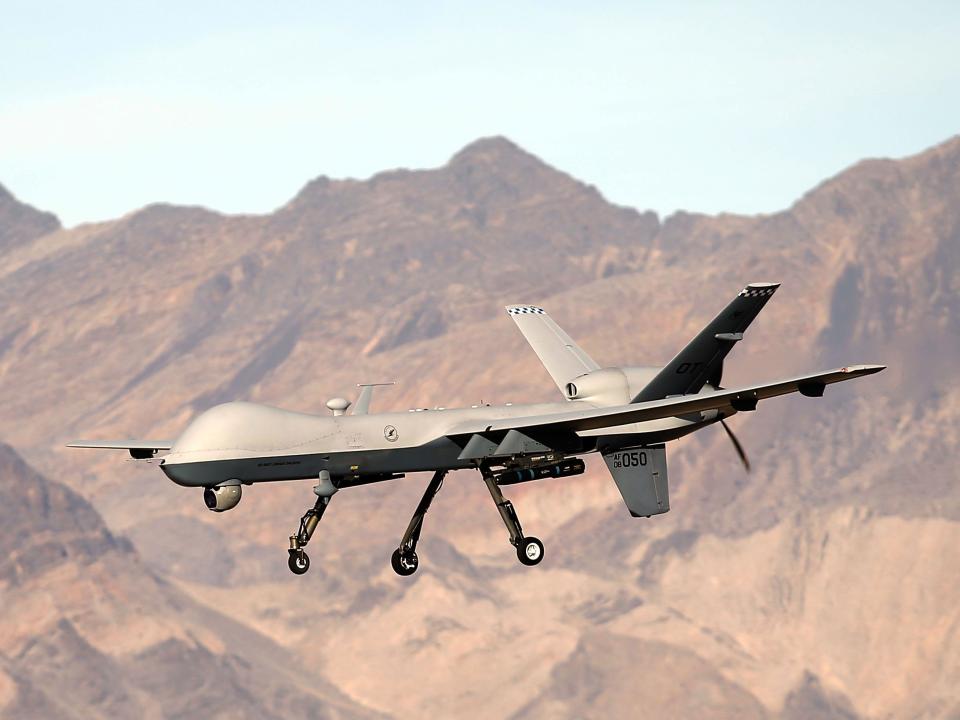 An MQ-9 Reaper remotely piloted aircraft (RPA) flies by during a training mission at Creech Air Force Base on November 17, 2015 in Indian Springs, Nevada.