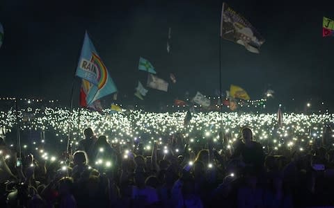 The audience for The Killers as they headlined the Pyramid Stage on Saturday - Credit: Henry Nicholls/Reuters