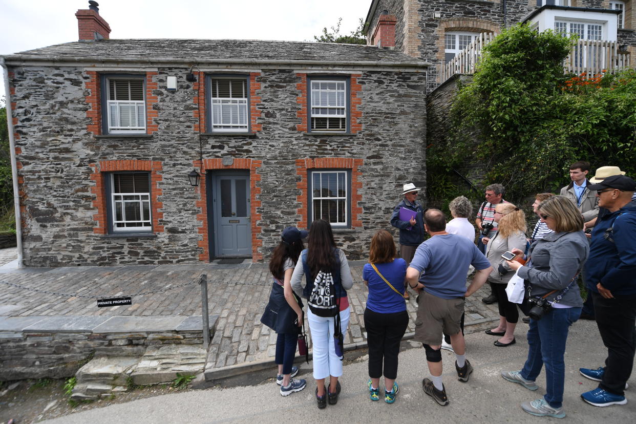 Doc Martin fans often visit the filming locations in the Cornish village of Port Isaac. (Getty)