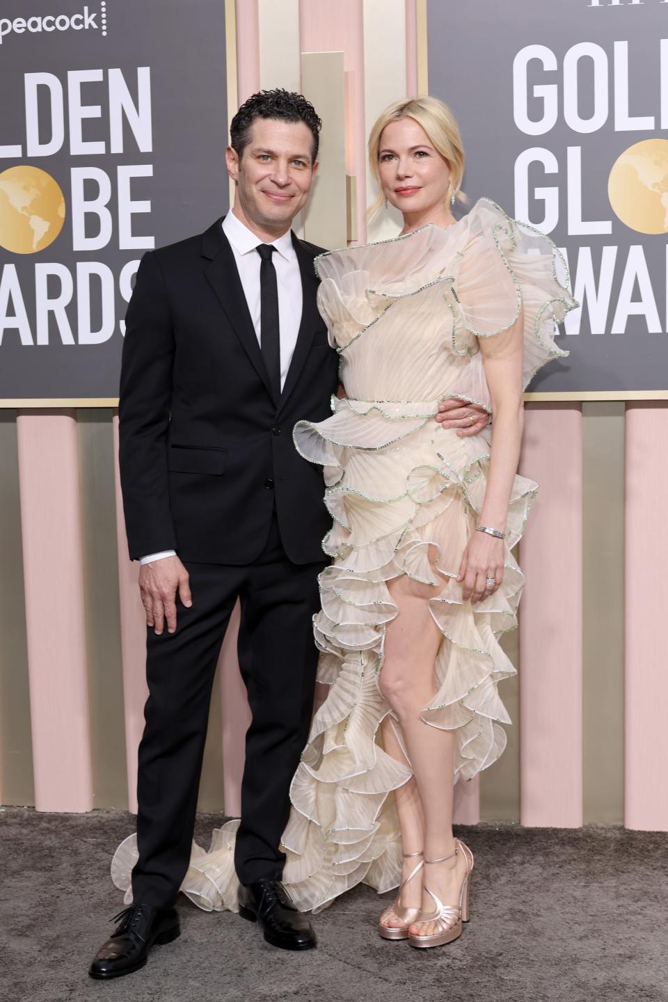 Thomas Kail and Michelle Williams attend the 2023 Golden Globes