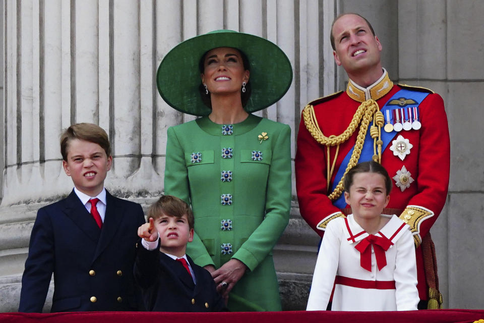 From left, Britain's Prince George, Prince Louis,, Kate, Princess of Wales, Prince William, and Princess Charlotte, view the flypast from the balcony of Buckingham Palace following the Trooping the Colour ceremony in central London, Saturday June 17, 2023. (Victoria Jones/PA via AP)