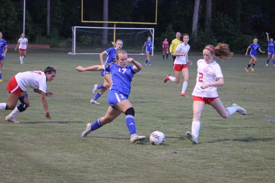 Morgan Rule of St. Andrew's battles for possession during the Lion playoff win over Deerfield-Windsor Wednesday.