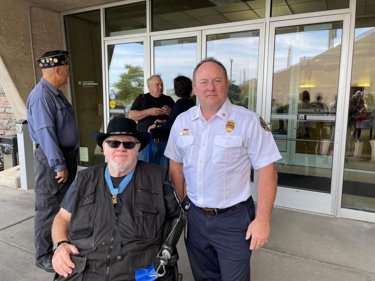 Gary Wetzel (left) and South Milwaukee Fire Chief John Litchford were at the War Memorial Center for a new Wisconsin Medal of Honor exhibit which honors Wetzel — he received the award in 1968.