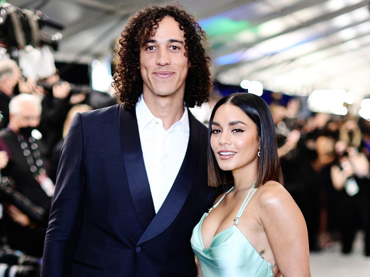 Cole Tucker and Vanessa Hudgens attend the 28th Screen Actors Guild Awards at Barker Hangar on February 27, 2022 in Santa Monica, California