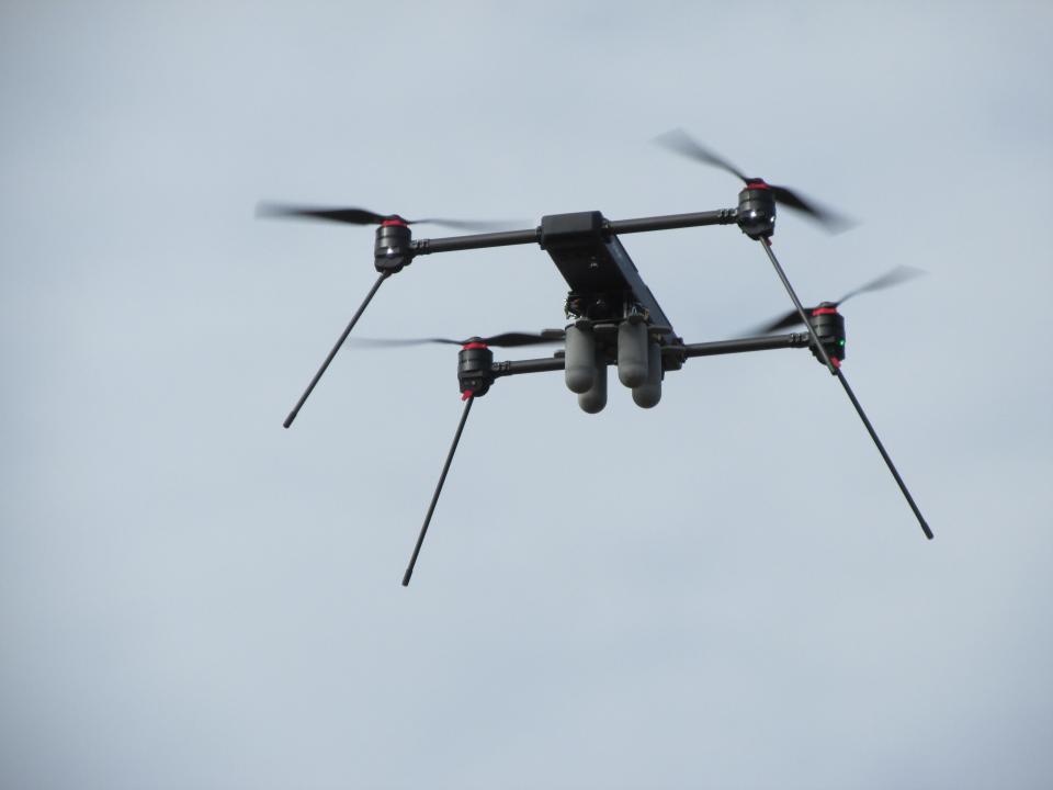 A small unmanned aircraft carries four configurable payload containers known as Mjölnir during a demonstration Thursday, Nov. 16, 2023, at The Range Complex in Autryville as part of the Global SOF Foundation's Modern Warfare Week.