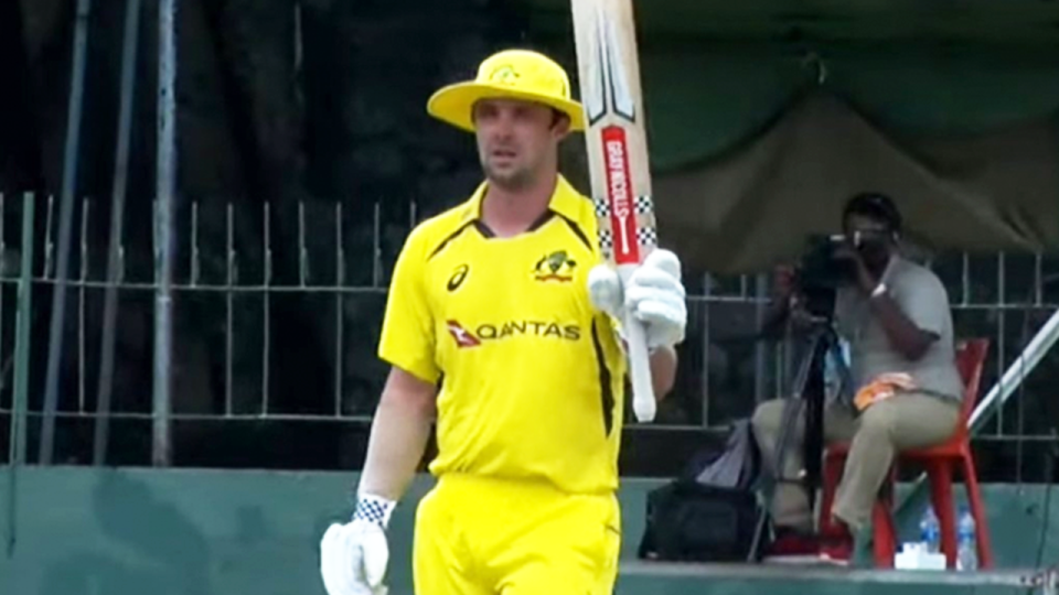 Travis Head (pictured) raising his bat after scoring an ODI century.