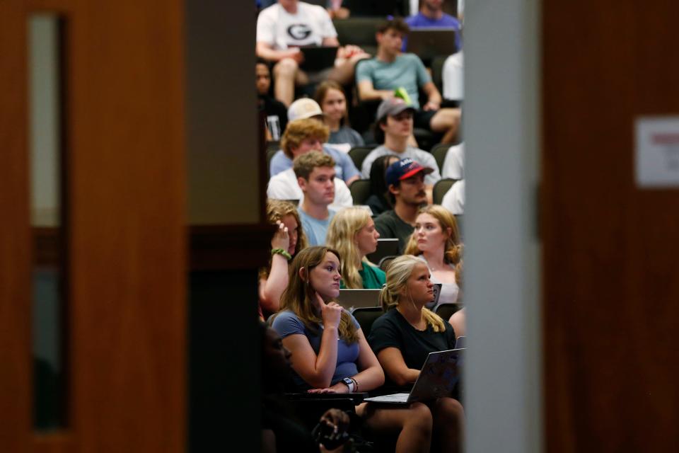 FILE - Regents on Tuesday approved a new strategic plan for the University System of Georgia. Here UGA students sit in class at the Miller Learning Center on the first day of the fall semester in Athens, Ga., on Wednesday, Aug. 17, 2022.