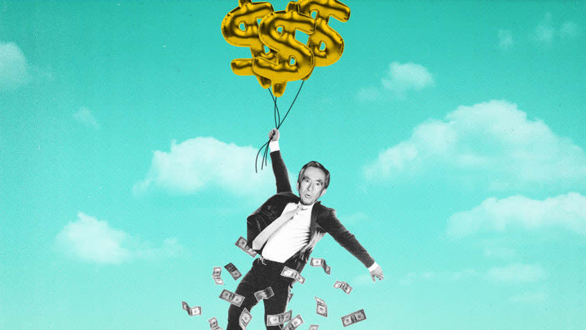 Bernard Arnault holding dollar balloon