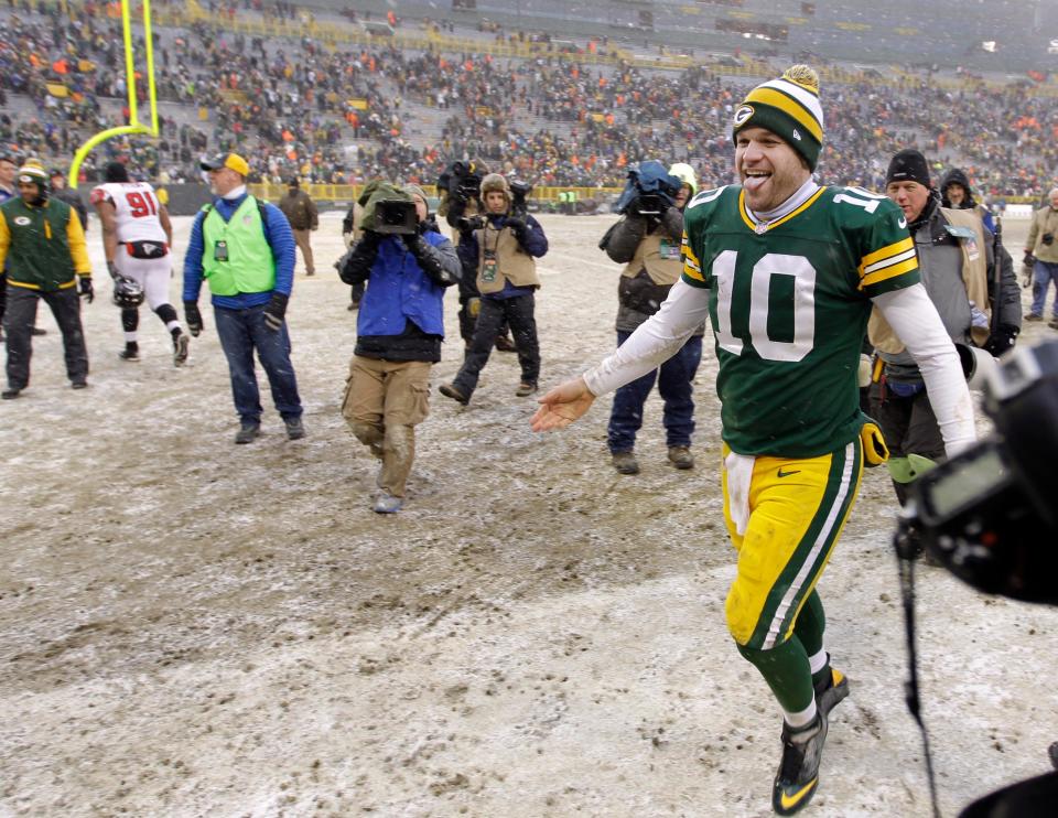 Green Bay Packers quarterback Matt Flynn (10) reacts coming off the field during the Packers 22-21 win over Atlanta during the NFL football game between the Green Bay Packers and Atlanta Falcons at Lambeau Field on Dec. 8, 2013.