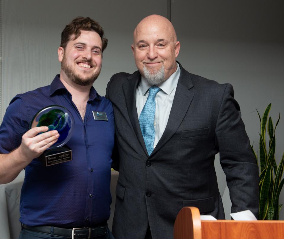 Sean Altice, co-owner of Altez Vacations, left, and Mike Gatz, Siesta Key Chamber of Commerce board chair. Altice was named the chamber's Businessperson of the Year.