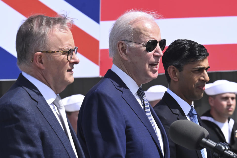 Britain's Prime Minister Rishi Sunak, right, meets with US President Joe Biden and Prime Minister of Australia Anthony Albanese, left, at Point Loma naval base in San Diego, US, Monday March 13, 2023, as part of Aukus, a trilateral security pact between Australia, the UK, and the US. (Leon Neal/Pool via AP)