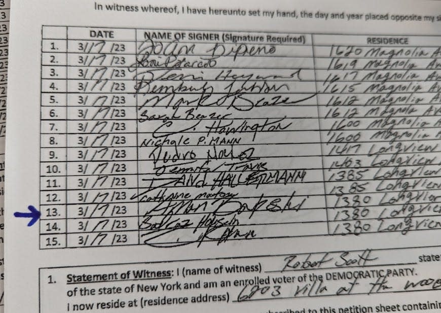 The signature of Aman Bakshi appeared on Rob Scott's nominating petition on line 13 of a petition sheet. At line 11 is the signature of David Hallerman, with his name misspelled. Bakshi died in 2017. Hallerman said he didn't sign the sheet, which was witnessed by Scott.