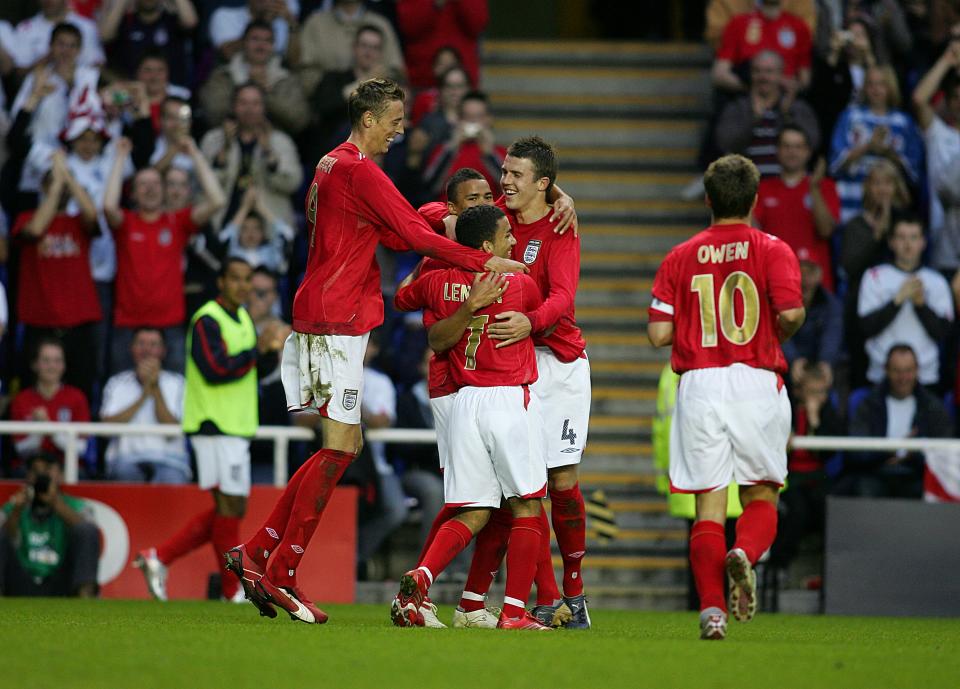 England's Jermaine Jenas (c) celebrates scoring the opening goal with l-r Peter Crouch, Aaron Lennon and Michael Carrick (Photo by Adam Davy - PA Images via Getty Images)