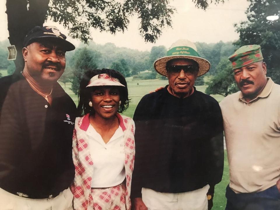 Hall of Fame Cleveland Browns running backs (from left) Leroy Kelly, Marion Motley and Jim Brown join former LPGA pioneer Renee Powell in an undated photo at Clearview Golf Club in East Canton.