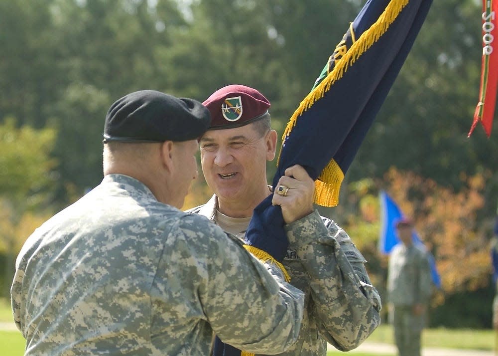 Then-Maj. Gen. David N. Blackledge receives the U.S. Army Civil Affairs & Psychological Operations Command colors from Maj. Gen. David N. Blackledge receives the U.S. Army Civil Affairs & Psychological Operations Command (Airborne) colors from Lt. Gen. Jack C. Stultz, commander of the U.S. Army Reserve Command, during a change of command ceremony in 2009.