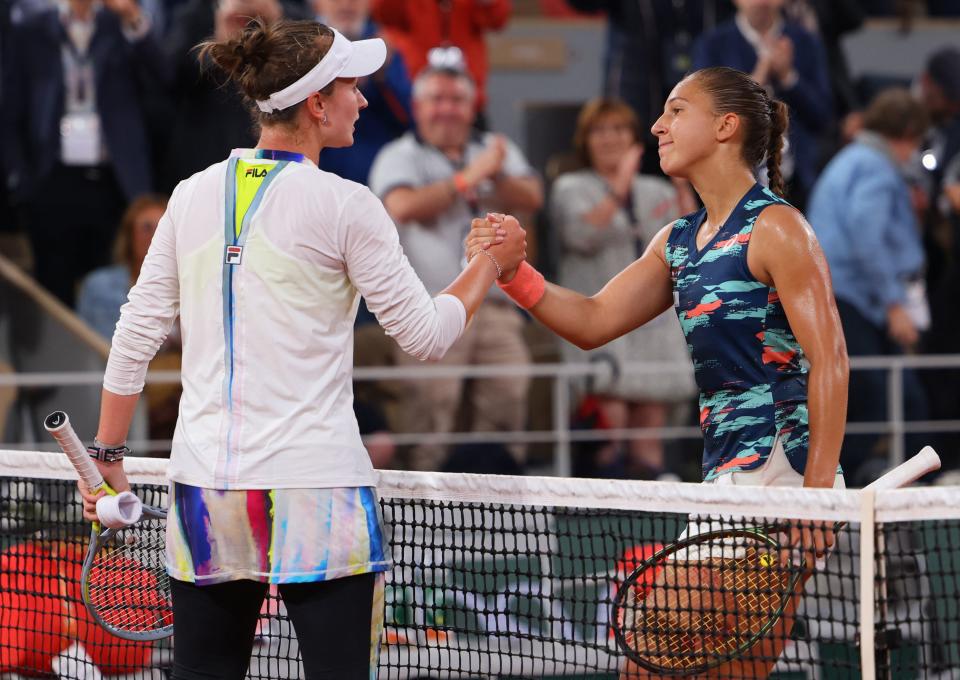 Diane Parry, pictured here shaking hands with Barbora Krejcikova after their match at the French Open.