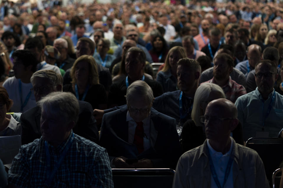 Attendees listen to Bruce Frank, a chair of the Southern Baptist Convention's sexual abuse task force, during its annual meeting in Anaheim, Calif., Tuesday, June 14, 2022. (AP Photo/Jae C. Hong)