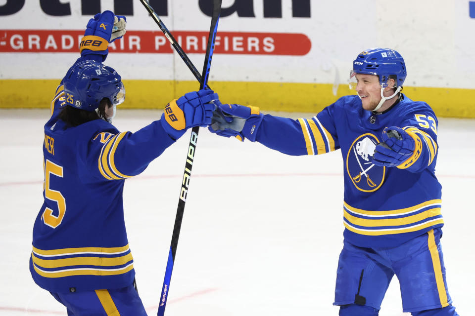 Buffalo Sabres left wing Jeff Skinner (53) celebrates his overtime goal against the Columbus Blue Jackets with defenseman Owen Power (25) in an NHL hockey game Saturday, Dec. 30, 2023, in Buffalo, N.Y. (AP Photo/Jeffrey T. Barnes)
