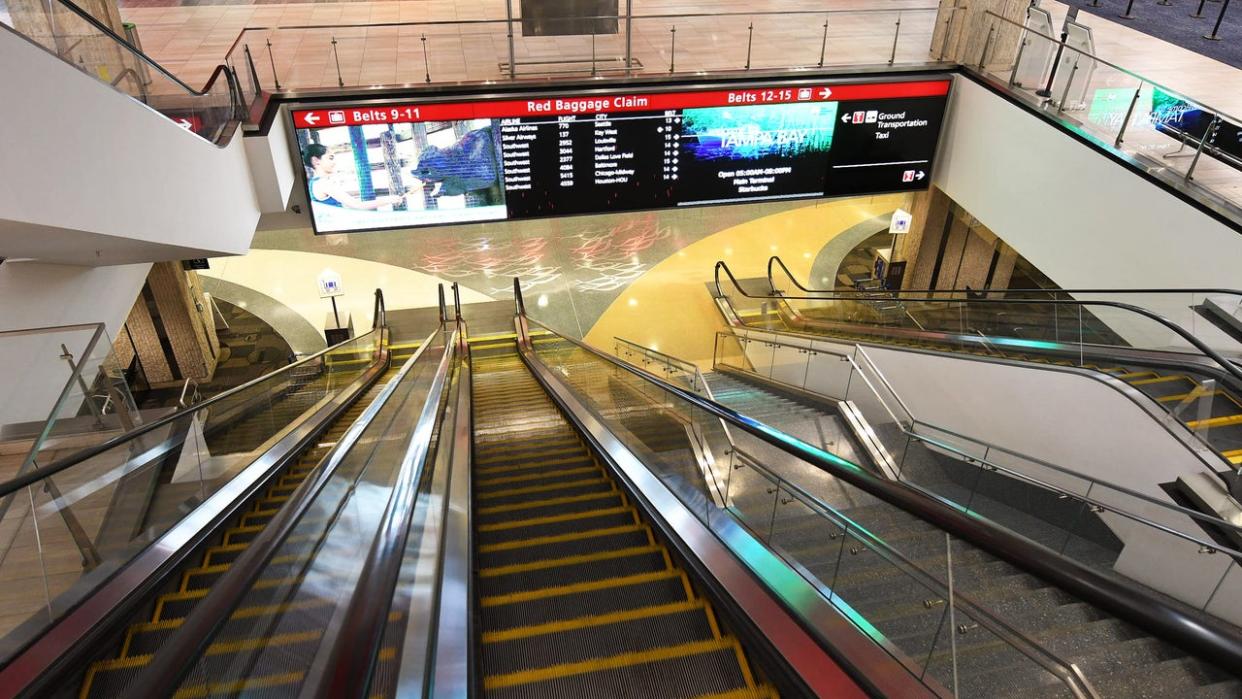 <div>FLORIDA, UNITED STATES - JULY 7: Empty escalators are seen at Tampa International Airport which closed from 5:00 p.m. until 10:00 a.m. as Tropical Storm Elsa moves northward toward the Tampa Bay area on July 6, 2021 in Clearwater Beach, Florida, United States. Storm is expected to make landfall on Floridas Gulf Coast as a Category 1 hurricane early Wednesday morning. (Photo by Paul Hennessy/Anadolu Agency via Getty Images)</div>