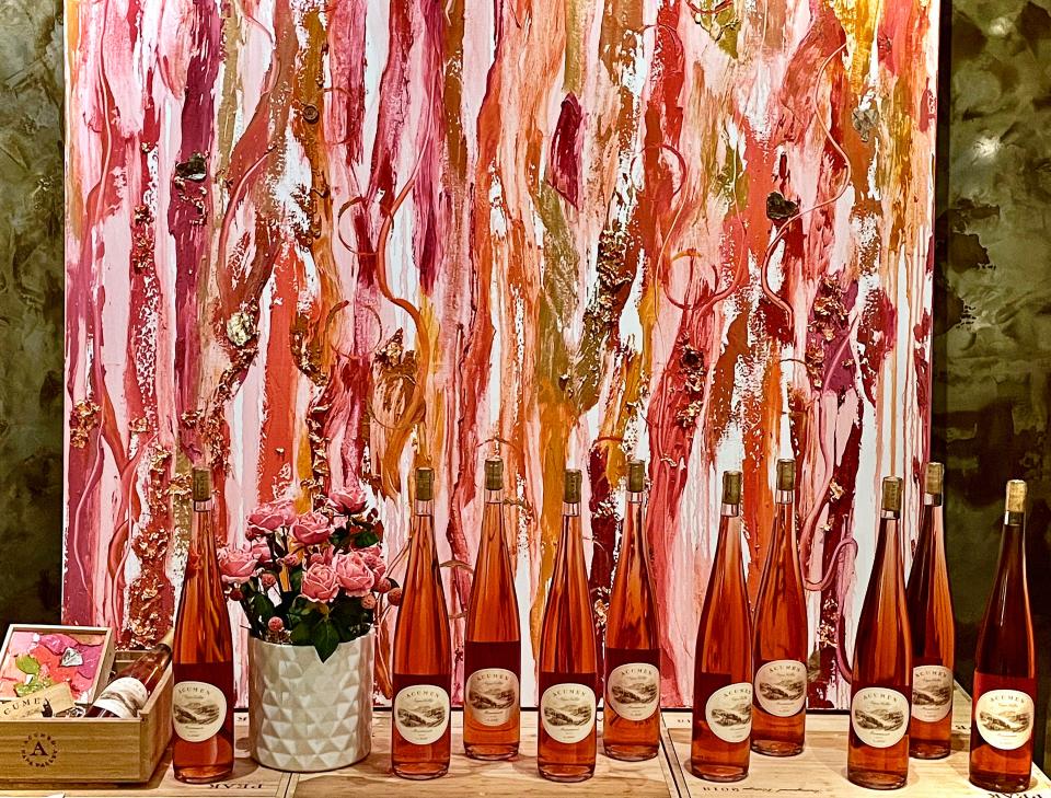 Acumen Wine’s current artist in residence, Penelope Moore’s painting makes the rosé display pop!