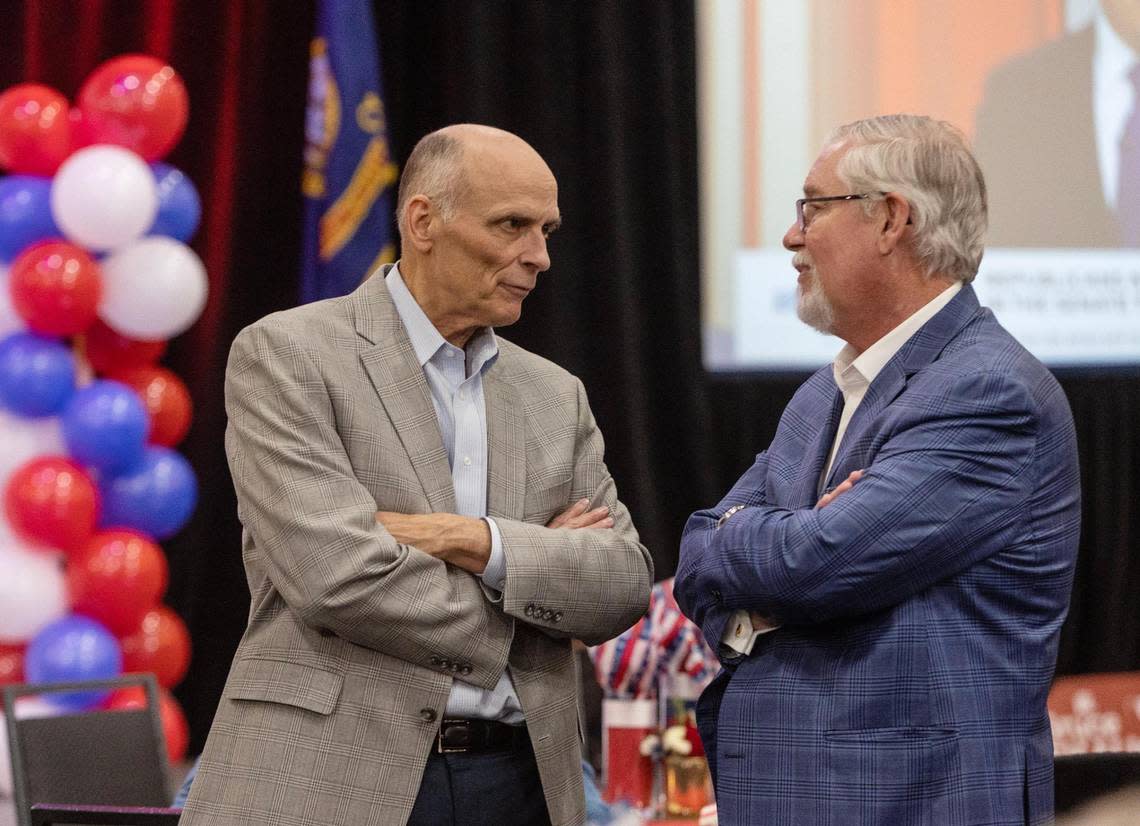 Sen. C. Scott Grow, R-Eagle (left), and Rep. Bruce Skaug, R-Nampa (right) talk at a watch party for Idaho Republican candidates at the Grove Hotel in Boise on Nov. 8, 2022.