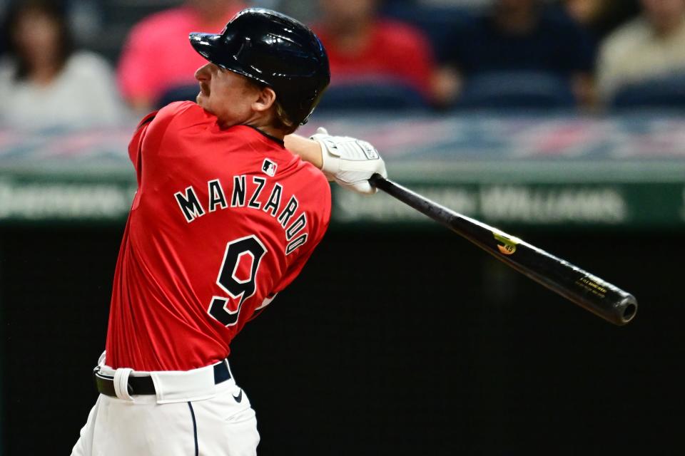 Cleveland Guardians designated hitter Kyle Manzardo (9) hits a two-run home run against the Minnesota Twins on Sept. 16 in Cleveland.