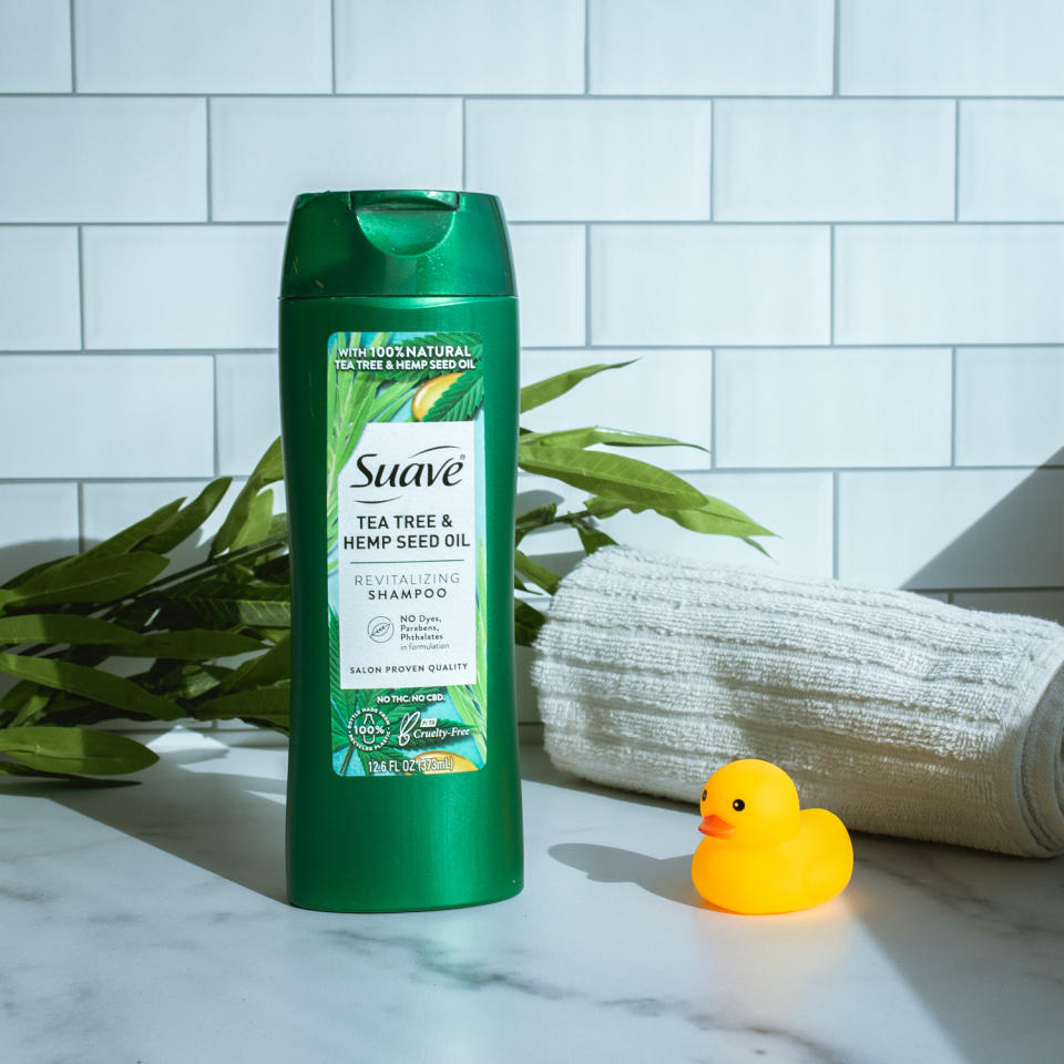 suave shampoo on marble with tile background with rubber duckie