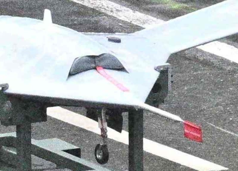 A close-up view of the covers over the engine intake and the pitot tube on one of the flying wing drones at the parade in Seoul. <em>ANTHONY WALLACE/AFP via Getty Images</em>