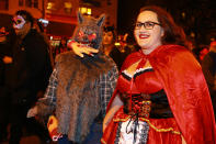 <p>This wolf has a mouthful of Little Red Riding Hood in the 44th annual Village Halloween Parade in New York City on Oct. 31, 2017. (Photo: Gordon Donovan/Yahoo News) </p>