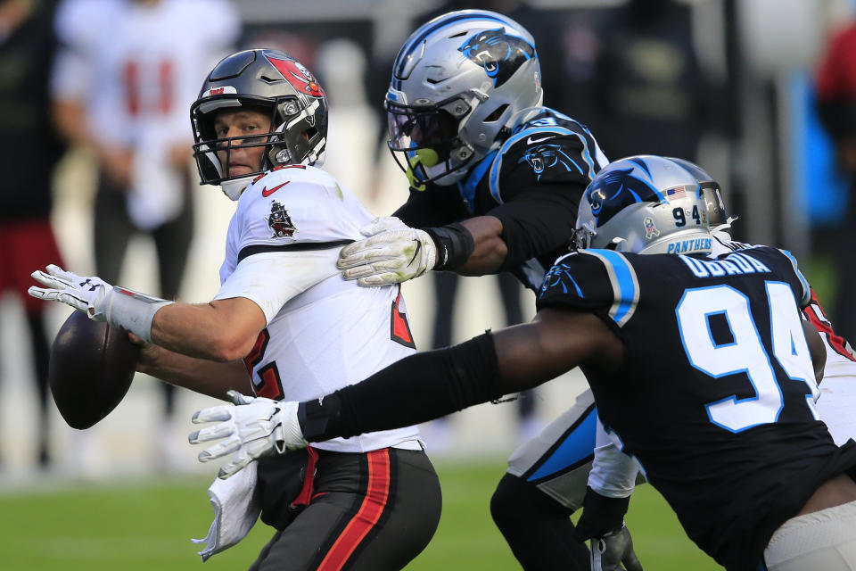 Tampa Bay Buccaneers quarterback Tom Brady (12) is sacked by the Carolina Panthers during the second half of an NFL football game, Sunday, Nov. 15, 2020, in Charlotte , N.C. (AP Photo/Brian Blanco)